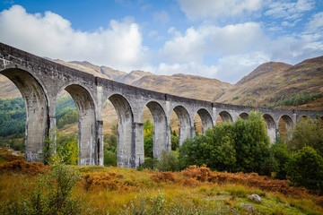 Glenfinnan Viaduct in the Scottish Highlands - obrazy, fototapety, plakaty