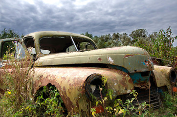 Old abandoned rustic car
