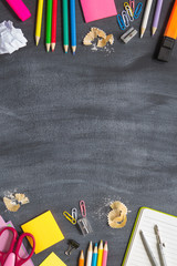 Concept Back To School Chalk Color Pencil Notebook Stationery on Blackboard Background. Design Copy Space Supplies Top View Flat Lay vertical layout © Natalia Mir