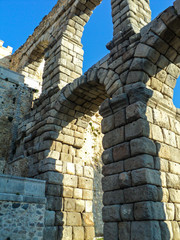 Roman aqueduct in Segovia, Spain. Famous Romanesque architectureis located in the Spanish province of Castilla. Beautiful tourist attraction.