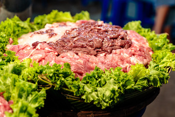 Raw of meats on ice ingredient for cook noodle at market, street food Thailand