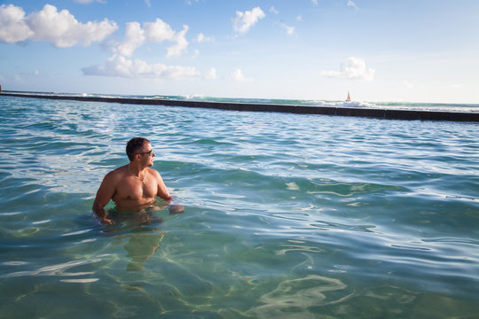 Male Hawaiian Body Builder At The Beach