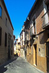 Fototapeta na wymiar Segovia Old Town, Spain. Beautiful ancient building on a city street.