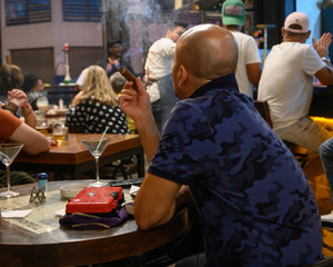 People sitting at caf�, Havana, Cuba