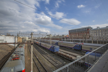 Obraz premium Parking of freight and passenger trains in the Krasnoselsky city district. Moscow, Russia