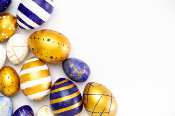 Happy Easter. Frame for text made of easter eggs trendy colored classic blue, white and golden on...