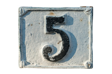 Old retro weathered cast iron plate with street number 5 closeup isolated on white background