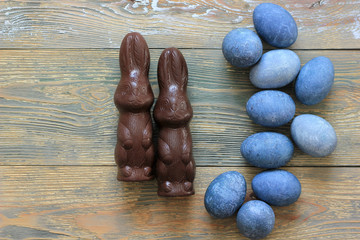 easter eggs classic blue colorful and chocolate bunny on a white background