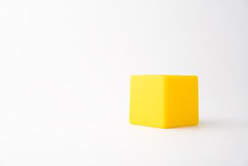 Plastic cube on the white background