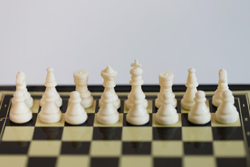 King piece chess in board game for compettition, checkmate in the chess board game training thinking and strategy.