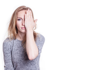 portrait of a young woman taking a prescrption test of her eye