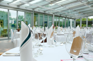 Before the event: Made tables with flowers and wineglasses