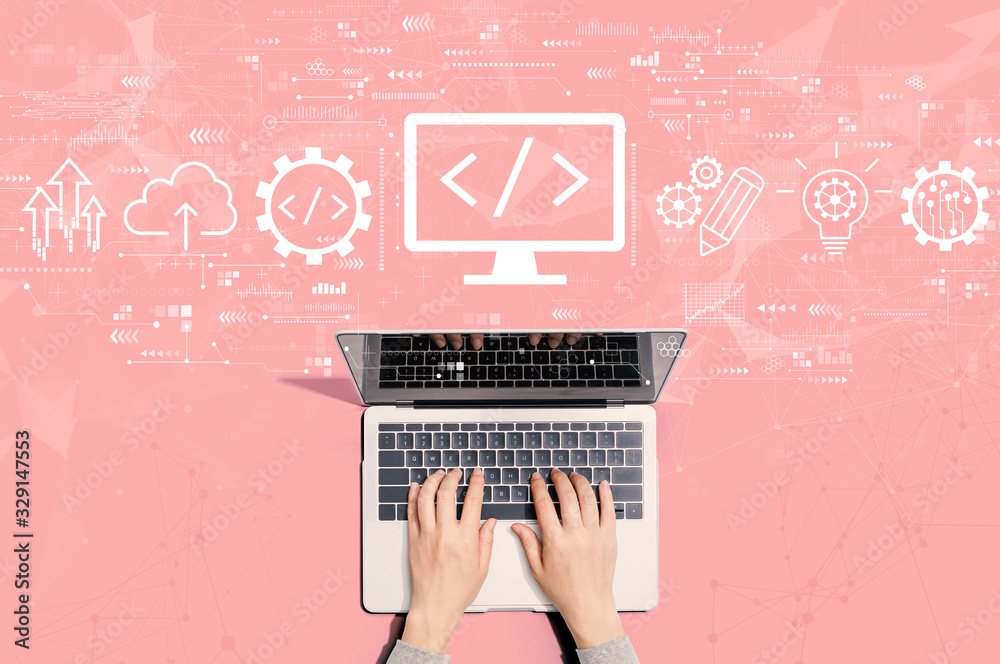 Wall mural web development concept with person using a laptop computer