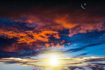 Crescent moon with beautiful sunset background . Generous Ramadan
