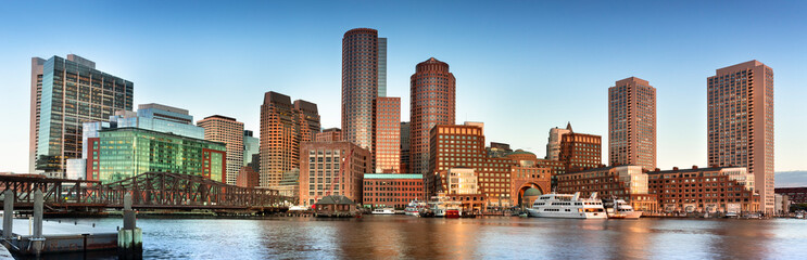 Downtown panoramic city view of Boston Massachusetts looking over the riverfront harbor from Fan Pier Park