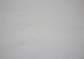 White grunge cement wall for texture background.