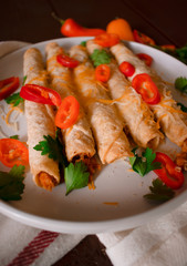 Cheese and chicken taquitos with jalapeño