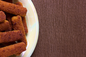 fried fish fingers with crust