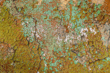 Texture of cracked old paint on a stone wall. Background