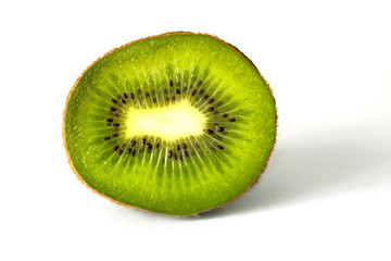 Slice of kiwi close up on white isolated background_