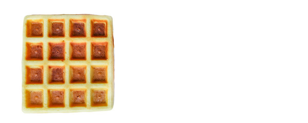 Belgian or Viennese waffles (delicious sweet dish, dessert snack) menu concept. background. top view. copy space for text