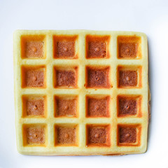 Belgian or Viennese waffles (delicious sweet dish, dessert snack) menu concept. background. top view. copy space for text