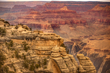 Tourists overlook the Grand Canyon from Mather Point tourist stop in the South Rim of the Grand Canyon National Park.