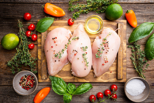 Fresh Raw Chicken Breast With Herbs And Spices, Top View. Culinary Cooking Ingredients