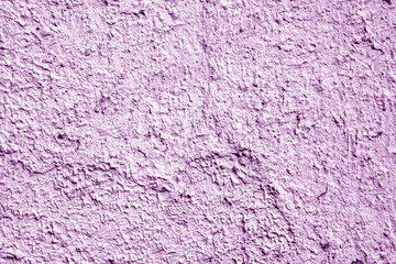 Painted cement wall background in purple color.
