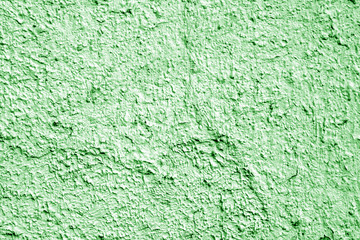 Painted cement wall background in green color.
