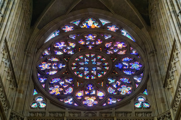 Colorful round window in Rotunda of St. Vitus in Prague