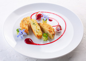 potato pancakes with cranberry sauce