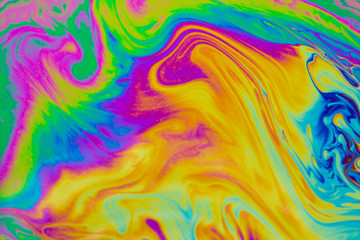 Psychedelic multicolored patterns background. Photo macro shot of soap bubbles
