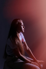 Teen girl in stylish clothes. Trend photos in 90s style. Toning photos with highlights.