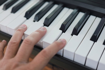 Fototapeta premium Man Hand to play Keyboard 