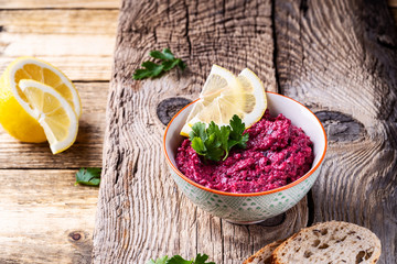 Beetroot horseradish  hummus served with whole grain bread
