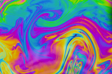 Fototapeta na wymiar Psychedelic abstract background. Photo macro shot with light interference on the surface of a soap bubble
