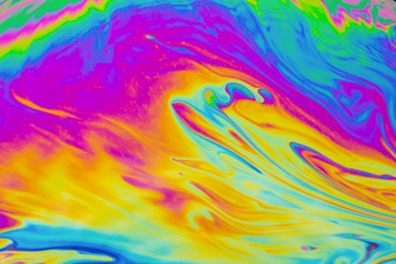 Psychedelic multicolored patterns background. Photo macro shot of soap bubbles