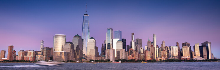 Buildings and skyscrapers of the Manhattan urban skyline over the Hudson river in New York USA