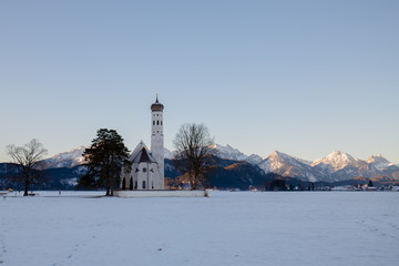St. Coloman church at sunrise in winter. Allg&auml;u, Germany