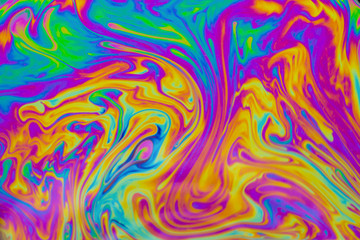 Fototapeta na wymiar Psychedelic multicolored patterns background. Photo macro shot of soap bubbles