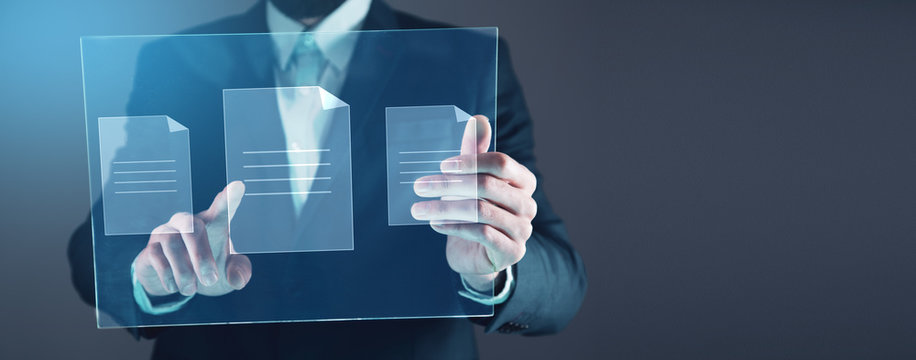 man touching files in screen