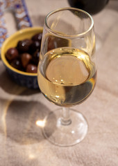 Fortified wine from Andalusia, Spain, different types of sherry in glasses and olives, colors of Andalusisa