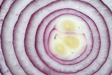 Sliced red onion close up. Backgrounds of vegetables.