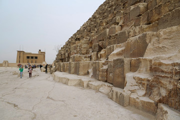 Tourists near Great Pyramid of Giza in Egypt