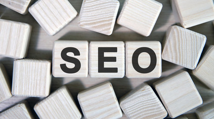 Seo concept. Wooden cubes and lots of cubes around