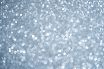 Abstract blurred fancy silver and white glitter sparkle confetti for background usage