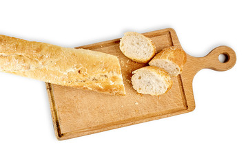 French lunch, breakfast baguette, Fresh natural French baguette, natural wooden cutting board, morning pastries from the bakery, delicate baguette, golden crust