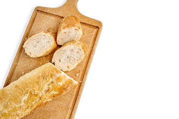 French lunch, breakfast baguette, Fresh natural French baguette, natural wooden cutting board, morning pastries from the bakery, delicate baguette, golden crust