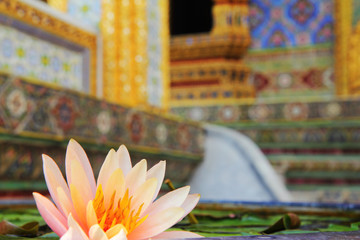 lotus on a bright mosaic background of a Buddhist monastery